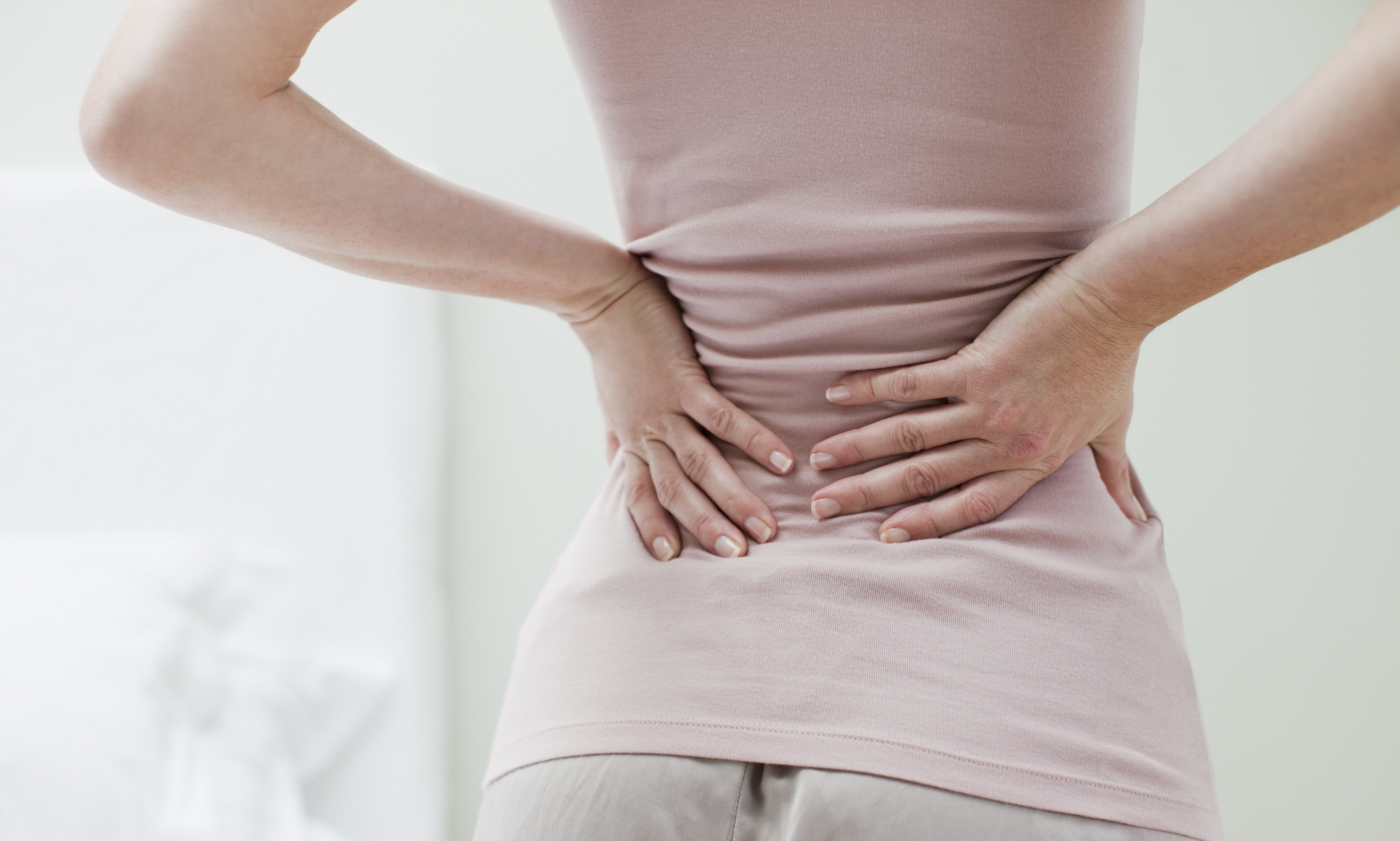 Woman with sciatica pain 